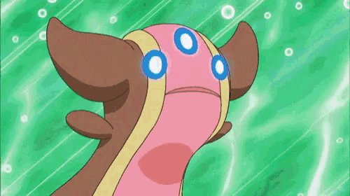 a cartoon character with three blue eyes and a pink nose