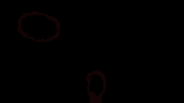 a person is standing in the shadows of a monster with red eyes .