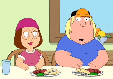 two cartoon characters are sitting at a table with plates of food on it