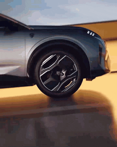 a close up of a car 's wheel with the letter s on it