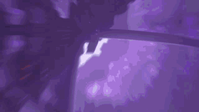 a purple room with a sign that says ' playing room ' on it