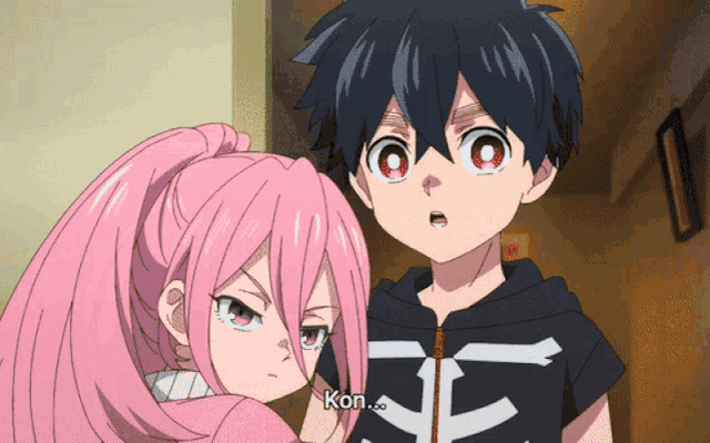 a boy and a girl are standing next to each other with kon written on the bottom