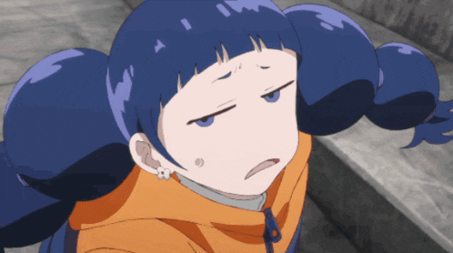 a girl with blue hair and pigtails is making a funny face