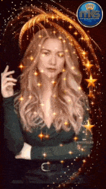 a woman in a green dress is surrounded by gold stars and sparkles