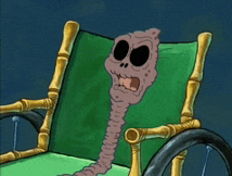 a cartoon character is sitting in a wheelchair with his mouth open