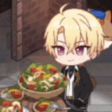 a boy is sitting at a table with a bowl of food .