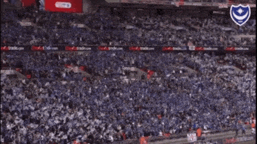 a stadium full of people with a banner that says ' sputation matters ' on it