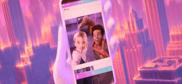 a hand is holding a cell phone with a picture of spider-man and gwen stacy on it .