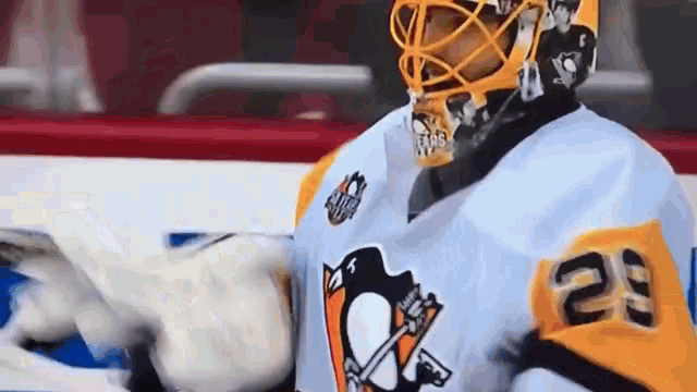 a hockey player with the number 29 on his shirt