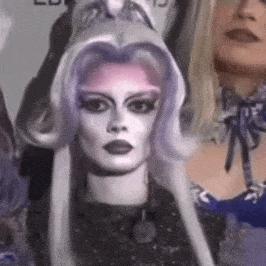 a close up of a mannequin with a wig on .
