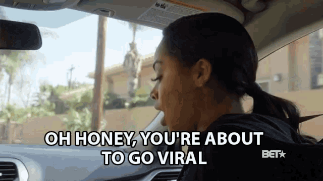 a woman in a car with the words oh honey you 're about to go viral