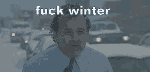 a man in a suit and tie says fuck winter what blizzard ? it 's couple of flakes