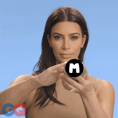 a woman is holding a stack of money in front of a blue background with the letter m on it