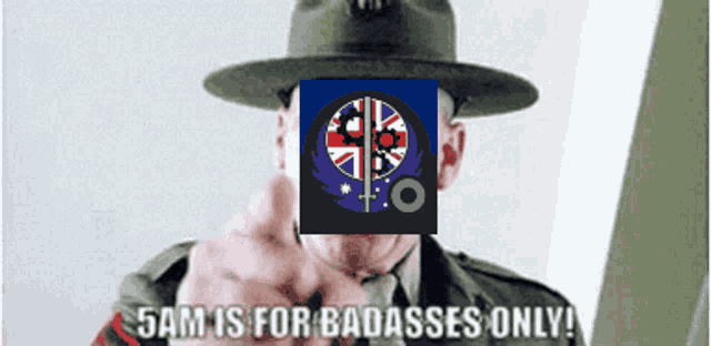 a man in a hat is pointing at the camera with the words 5am is for badasses only on the bottom