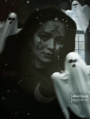 a photo of a woman surrounded by ghosts with the hashtag #photolab.me at the bottom