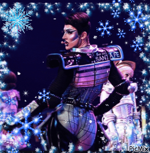 a man in a santa fe costume is surrounded by blue snowflakes