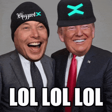 a man in a suit and tie laughs next to a man wearing a hat that says hazzard x