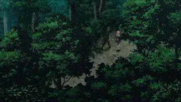 a man and a woman are standing in a forest