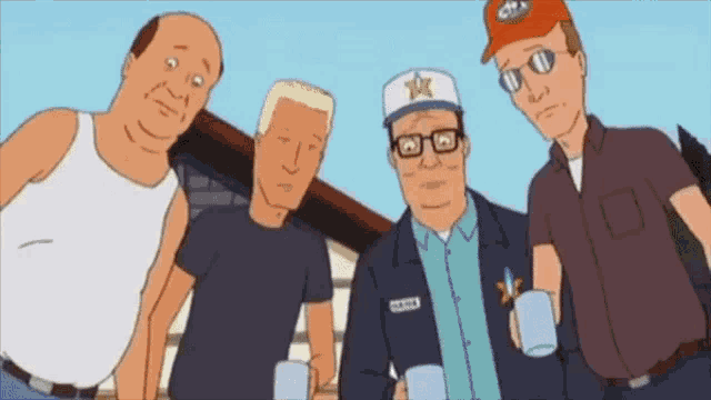a group of men are posing for a picture and one of them has a star on his hat