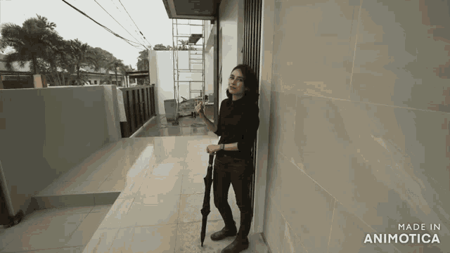a woman leaning against a wall with an umbrella made in animotica