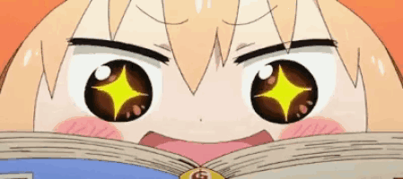 a close up of a cartoon character 's eyes with a star in them .
