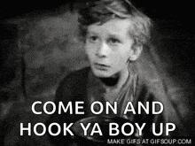 a black and white photo of a boy with the words come on and hook ya boy up above him