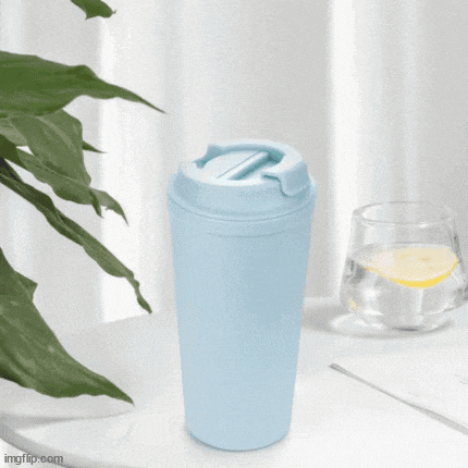 three different colored mugs are sitting on a shelf