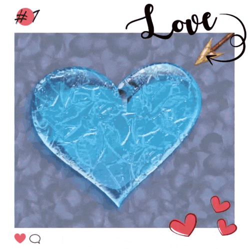 a picture of a heart made of ice with the word love on it