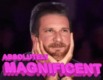 a man with his hands on his face with the words absolutely magnificent above him