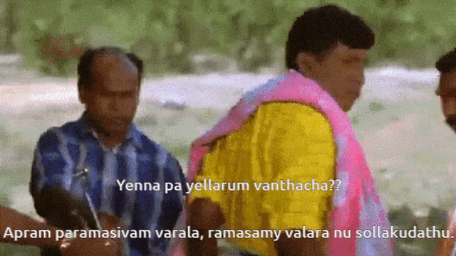 a man in a yellow shirt says yenna pa yellarum vanthacha?