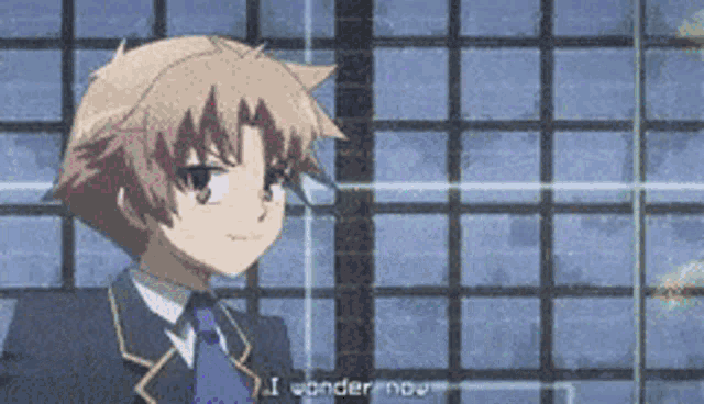 a boy in a suit and tie is standing in front of a window and says i wonder now