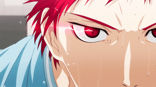 a close up of a person with red hair