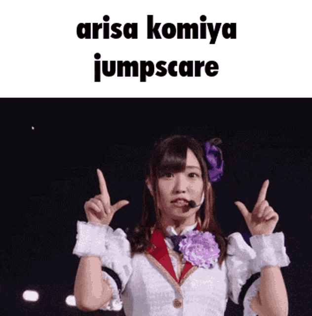 a picture of a girl with a microphone and the words arisa komiya jumpscare below her