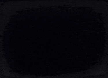 a cartoon character with green hair is standing in front of a dark curtain