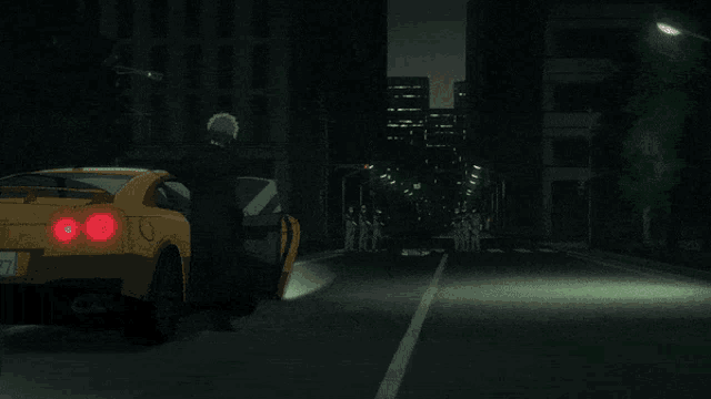 a yellow car with a license plate that says 77 is parked on the side of the road