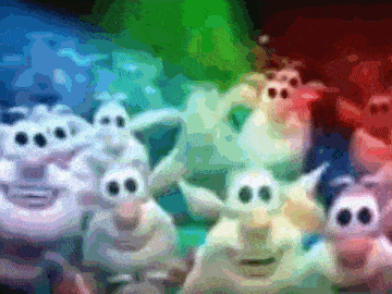 a blurred image of a group of ghosts with a green background