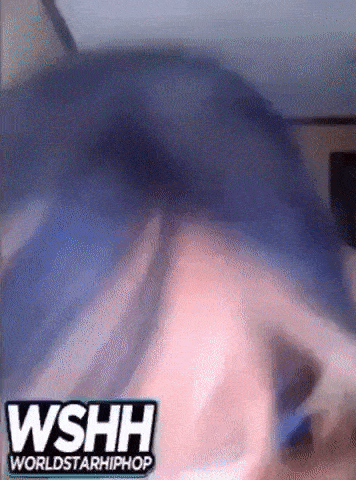 a close up of a person 's face with blue hair and a worldstarhiphop logo .
