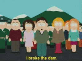 a group of people standing in front of a mountain with the words " i broke the dam "
