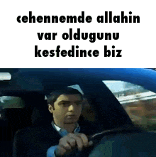 a man is driving a car with the words cehennemde allahin var oldugunu kesfedince biz