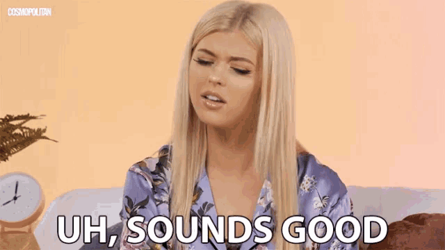 a woman sitting on a couch with the words uh sounds good written on her face