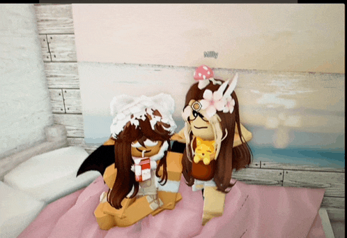 two girls are sitting on a bed in front of a wall that says kitty