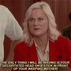 a woman in a red jacket is saying the only thing i will be waving