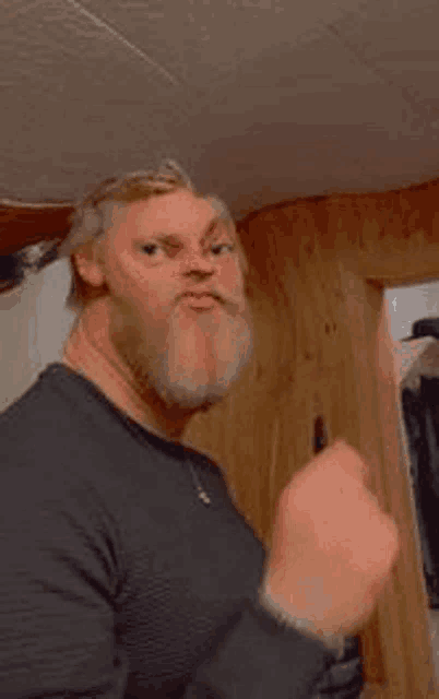 a picture of a man with a beard and the words bonk on the bottom
