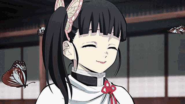 a girl with a ponytail and a headband is smiling with butterflies flying around her head .