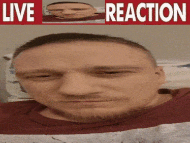 a man with a beard is laying in bed with the words live reaction above him