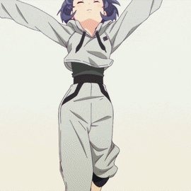a girl with purple hair is wearing a grey hoodie and pants