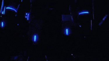 a futuristic robot with a blue helmet and gloves