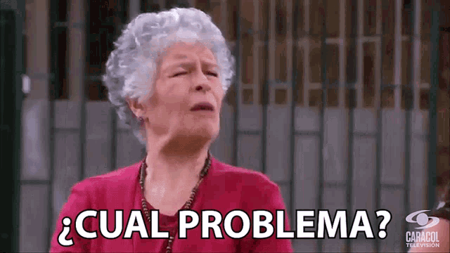 a woman with gray hair says cual problema in spanish