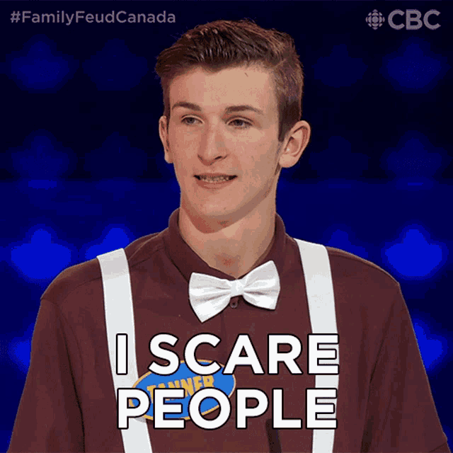 a young man wearing a bow tie and suspenders says " i scare people "