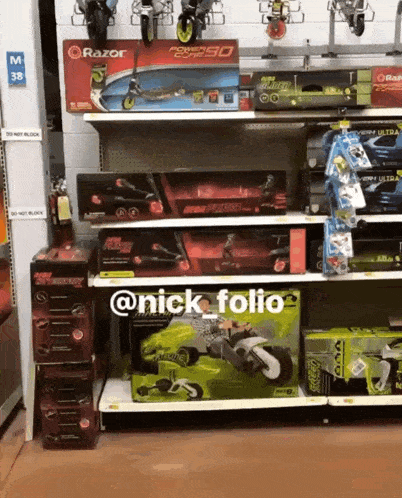 a razor scooter sits on a shelf in a toy store